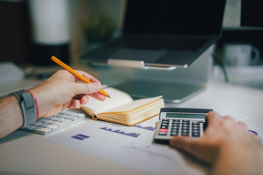 How to budget your paycheck with a calculator and financial planning materials